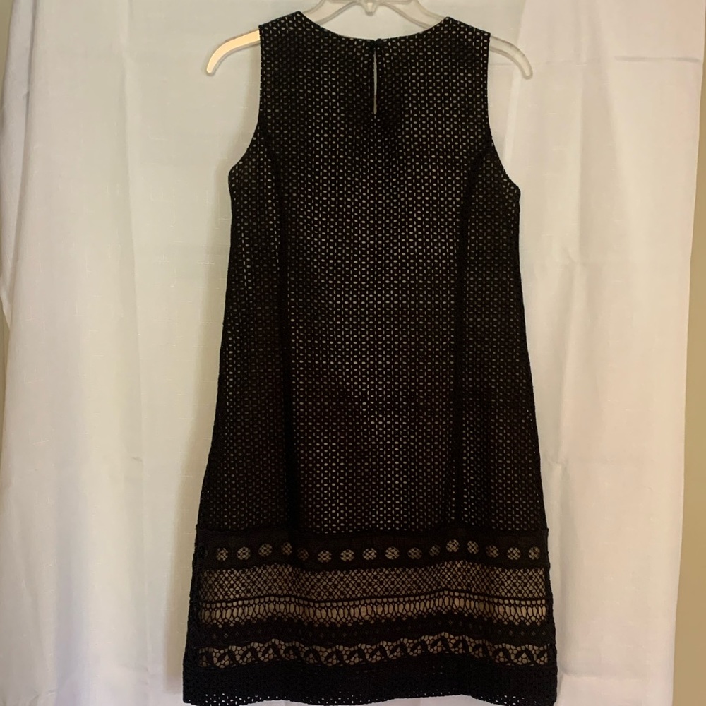 Black eyelet dress.